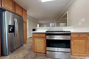 551 Village Green Ct, Lilburn, GA 30047 - Photo 18