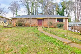 562 Dickens Rd NW, Lilburn, GA 30047 - Photo 1