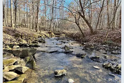 8555 Woodland Brooke Trail, Cumming, GA 30028 - Photo 10