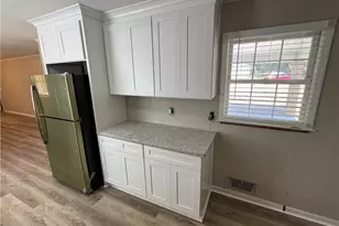 5594 Laurel Ln NW, Lilburn, GA 30047 - Photo 10
