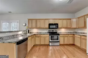 2749 Suttonwood Way, Buford, GA 30519 - Photo 6