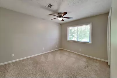 3681 Bittercreek Way SW, Lilburn, GA 30047 - Photo 16