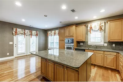 7042 Tree House Way, Flowery Branch, GA 30542 - Photo 18