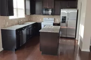 566 Jody Pl, Lilburn, GA 30047 - Photo 2
