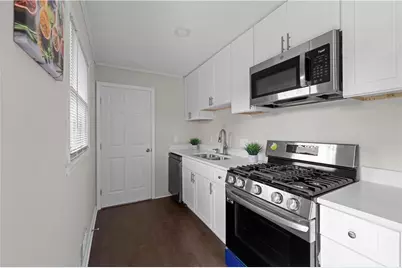 5245 Stonewall Tell Road, Atlanta, GA 30349 - Photo 10