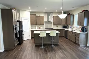 4819 Sierra Creek Dr NE, Hoschton, GA 30548 - Photo 8
