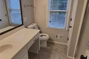 5760 Dovnick Dr SW, Lilburn, GA 30047 - Photo 18