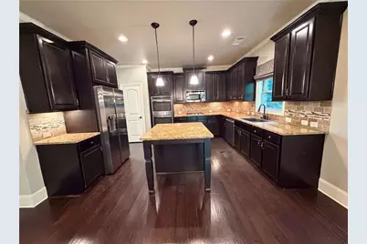 8785 Ellesmere Drive, Cumming, GA 30041 - Photo 16