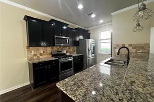 750 Village Field Ct, Suwanee, GA 30024 - Photo 4