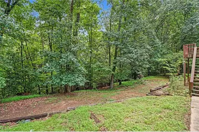 3884 Hunting Ridge Drive SW, Lilburn, GA 30047 - Photo 34