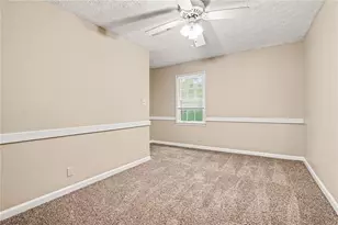 3884 Hunting Ridge Dr SW, Lilburn, GA 30047 - Photo 18