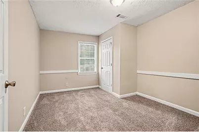 3884 Hunting Ridge Drive SW, Lilburn, GA 30047 - Photo 24