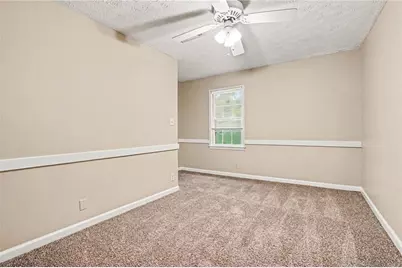 3884 Hunting Ridge Drive SW, Lilburn, GA 30047 - Photo 18