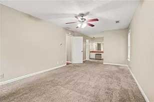 3884 Hunting Ridge Dr SW, Lilburn, GA 30047 - Photo 14