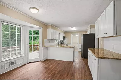 3884 Hunting Ridge Drive SW, Lilburn, GA 30047 - Photo 6