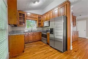 5040 Huntshire Ln SW, Lilburn, GA 30047 - Photo 14
