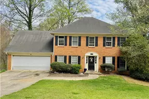 5040 Huntshire Ln SW, Lilburn, GA 30047 - Photo 1