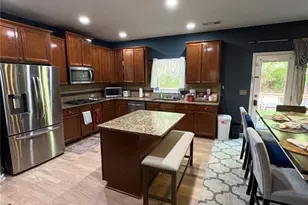 180 Village Green Ct SW, Lilburn, GA 30047 - Photo 8