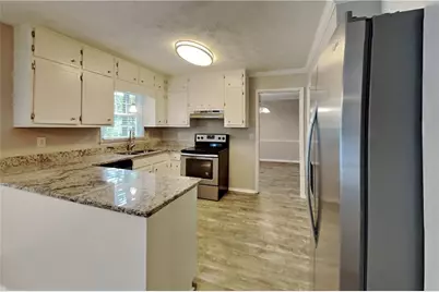 1308 Chesapeake Drive SW, Lilburn, GA 30047 - Photo 6