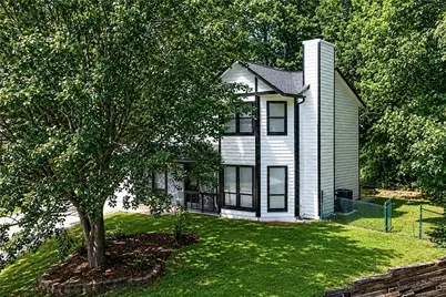 556 Sunfield Drive NW, Lilburn, GA 30047 - Photo 1