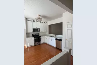 4645 Valais Court Unit #107, Alpharetta, GA 30022 - Photo 2