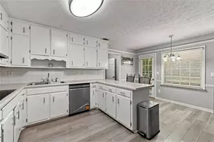 5497 Georgetown Trce SW, Lilburn, GA 30047 - Photo 16