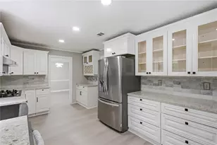 24 Planters Dr SW, Lilburn, GA 30047 - Photo 12