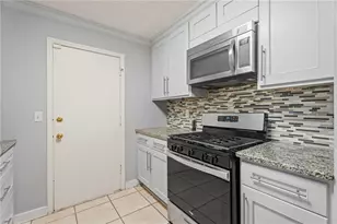 661 Sunfield Dr NW, Lilburn, GA 30047 - Photo 18