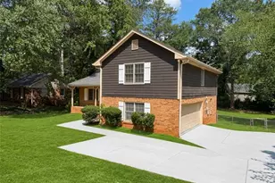 676 Killian Hill Rd SW, Lilburn, GA 30047 - Photo 1