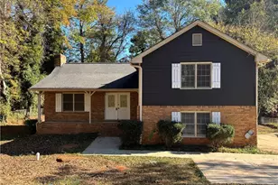 676 Killian Hill Rd SW, Lilburn, GA 30047 - Photo 1