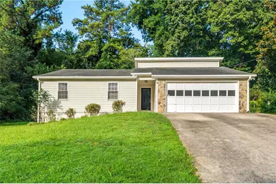 654 Village Creek Drive SW, Lilburn, GA 30047 - Photo 1