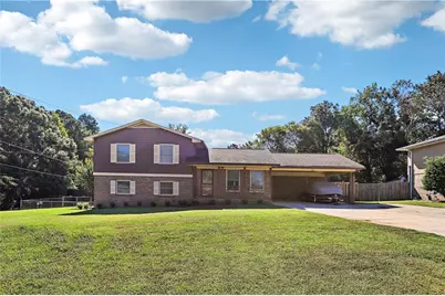 4542 Burns Road NW, Lilburn, GA 30047 - Photo 1