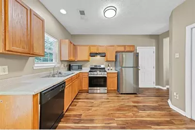 5745 Old Carriage Drive, Atlanta, GA 30349 - Photo 10