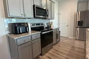 11633 Mendenhall Ct, Hampton, GA 30228 - Photo 6