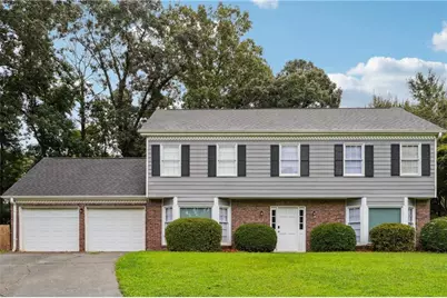 1416 Manchester Court SW, Lilburn, GA 30047 - Photo 1