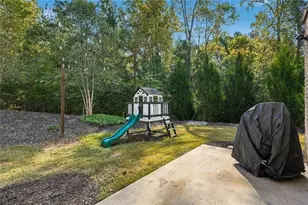 209 Magnolia Creek Way, Woodstock, GA 30188 - Photo 28