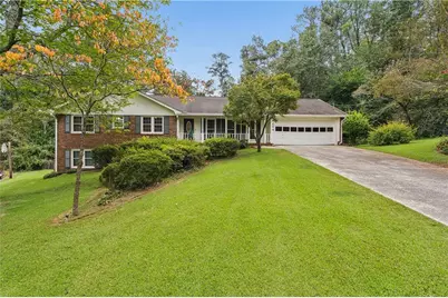 1694 Bent River Drive SW, Lilburn, GA 30047 - Photo 1