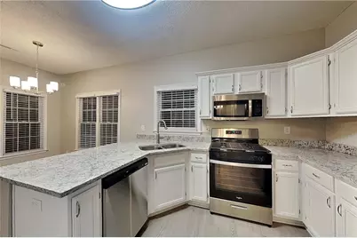 7115 Big Woods Drive, Woodstock, GA 30189 - Photo 4