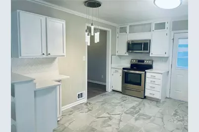 471 Village Green Court SW, Lilburn, GA 30047 - Photo 2
