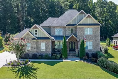 233 Scenic Falls Boulevard, Hoschton, GA 30548 - Photo 1