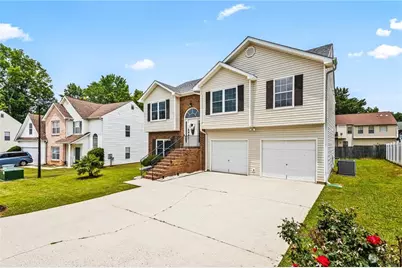 1543 Blossom Drive, Atlanta, GA 30349 - Photo 1