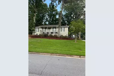 3911 Millwood Lane NW, Lilburn, GA 30047 - Photo 1