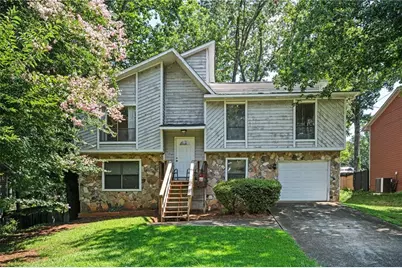 1069 Glasgow Drive NW, Lilburn, GA 30047 - Photo 1