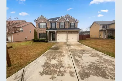 7737 Sylvaner Lane, Atlanta, GA 30349 - Photo 1