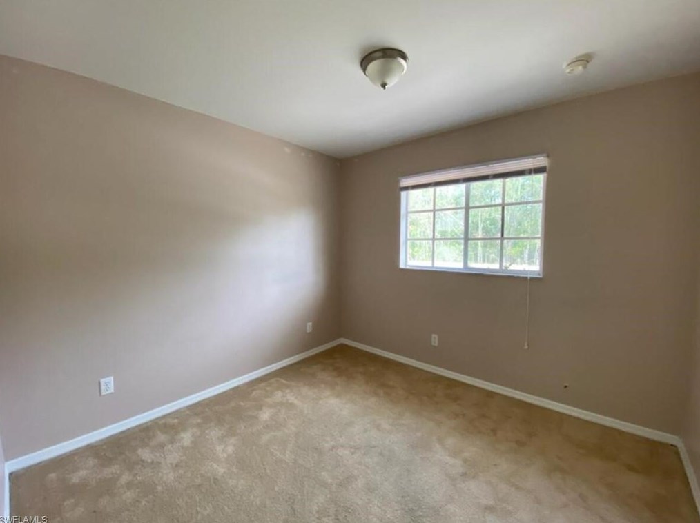 566 Nimitz Blvd, Lehigh Acres, FL 33974