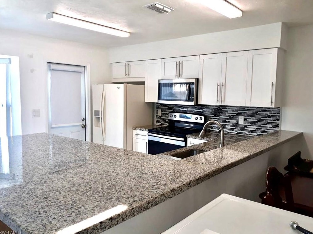 222 Oakmont Pkwy, Lehigh Acres, FL 33936