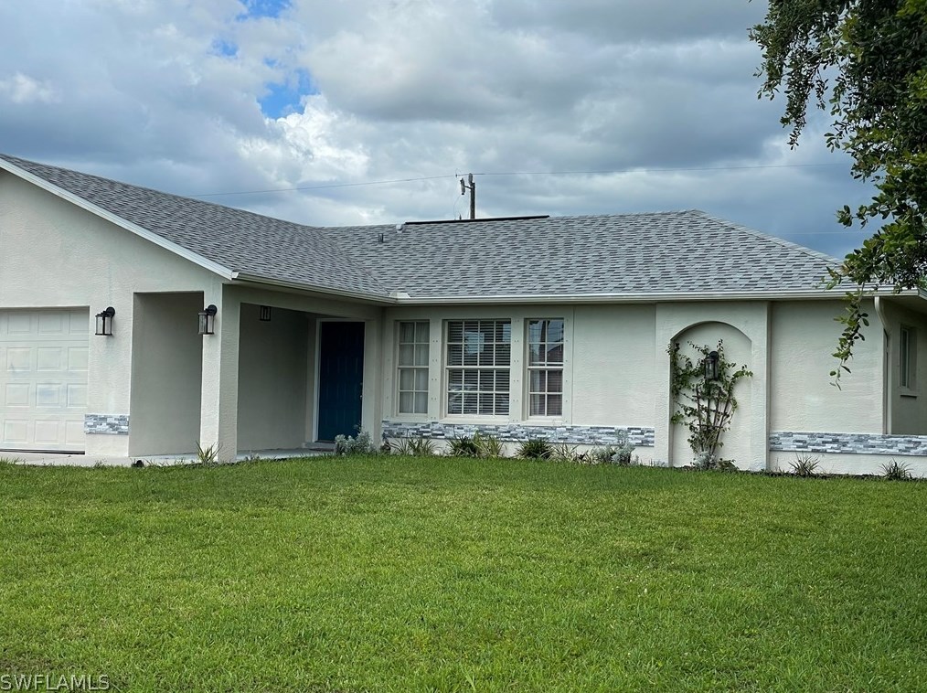 907 Nicholas Pkwy, Cape Coral, FL 33991-2562
