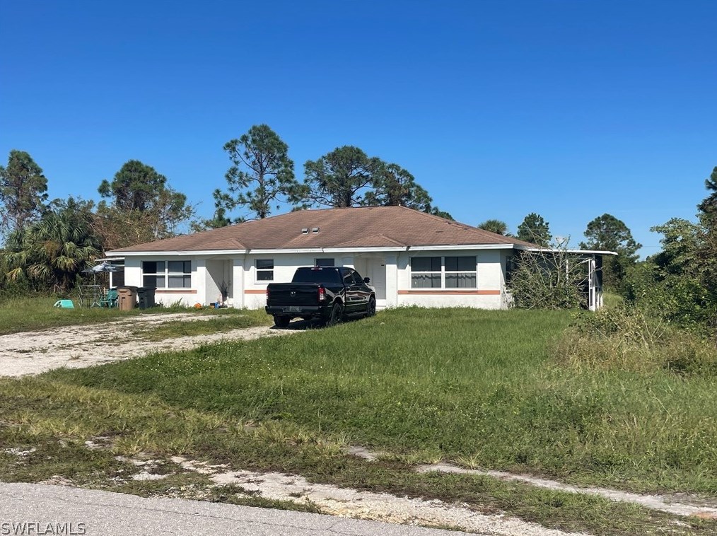 953 Eisenhower Blvd, Lehigh Acres, FL 33974