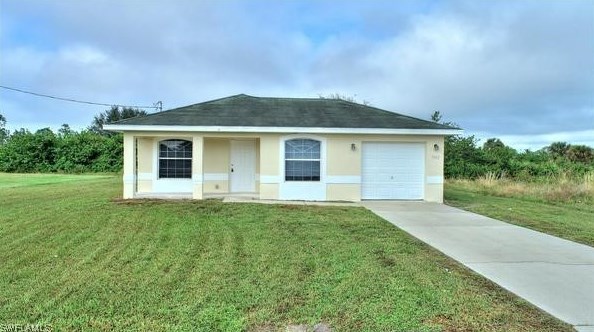 1062 Countess Ave, Lehigh Acres, FL 33974