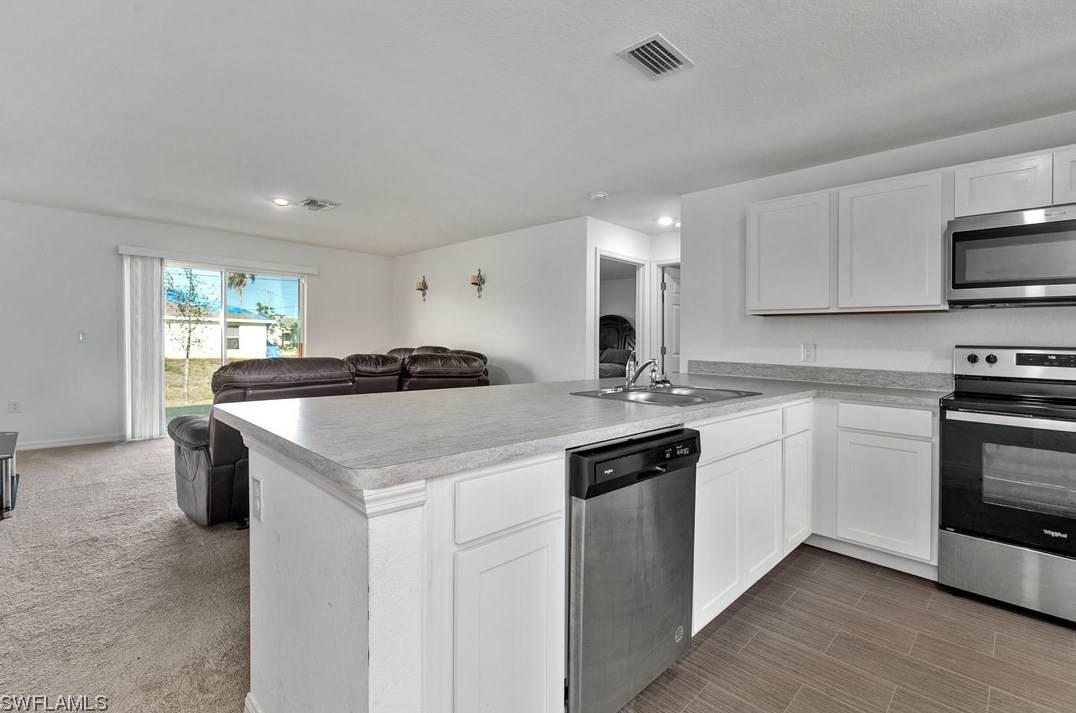1818 17th Ave, Cape Coral, FL 33909-5457